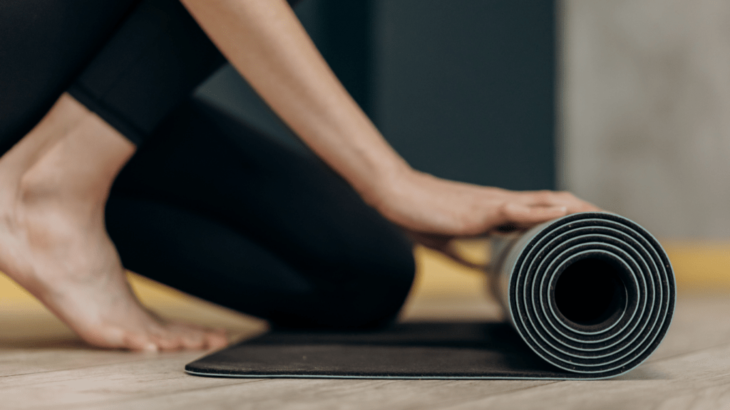 Folding  a Yoga mat